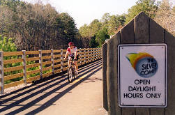 Silver Comet Trail Biker with Trail Sign